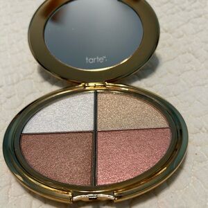 Tarte highlighter and eye shadow. Brand new, never used as can see in pics.